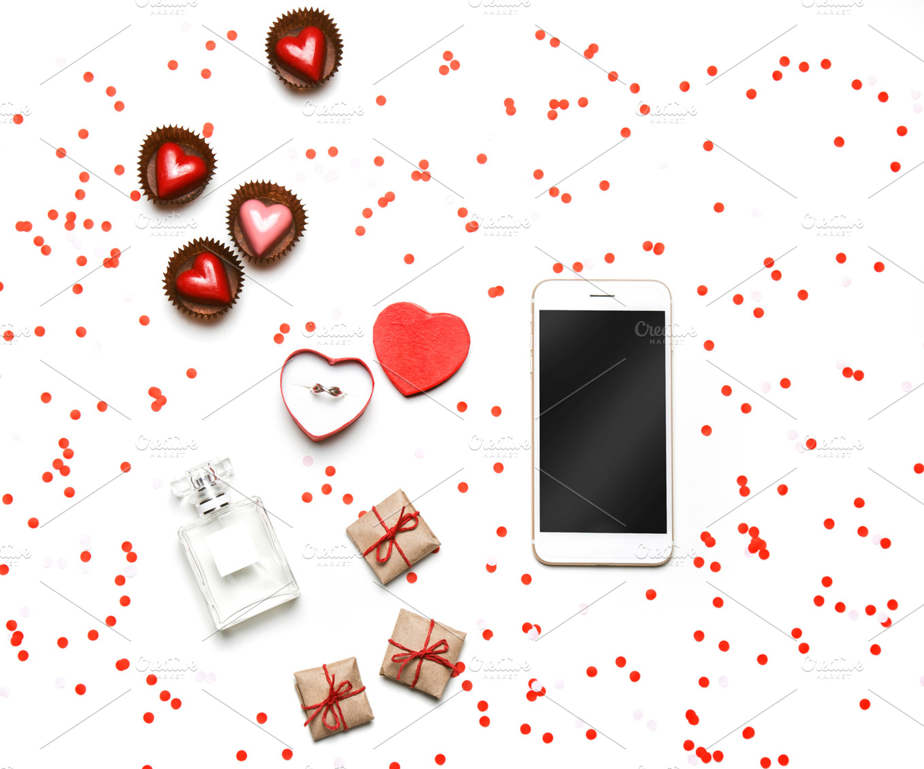 Flatlay with confetti & smartphone, a Holiday Photo by KateAedon