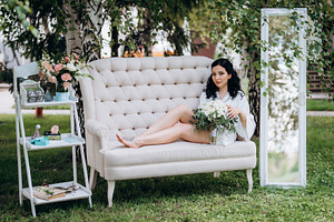 black-haired bride prepares for her wedding in a boudoir, a Person Photo by Weddings, People, Travel
