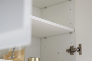 Minimalist kitchen cabinet with empty shelves and simple food storage at home, a Food & Drink Photo by etorres69