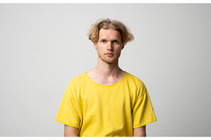Young man with blond hair and light, a Person Photo by volodymyrshtun13795