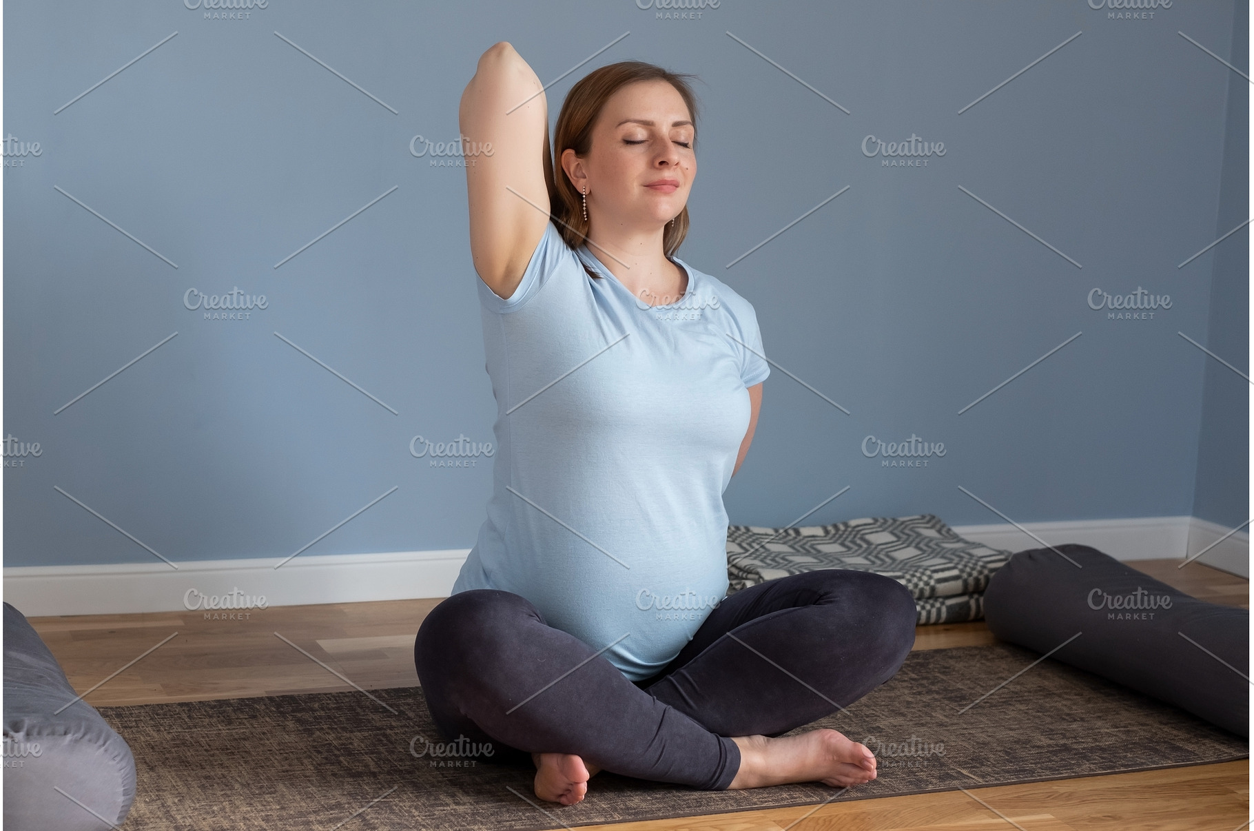 Pregnant woman doing prenatal yoga, a Person Photo by Koldunov