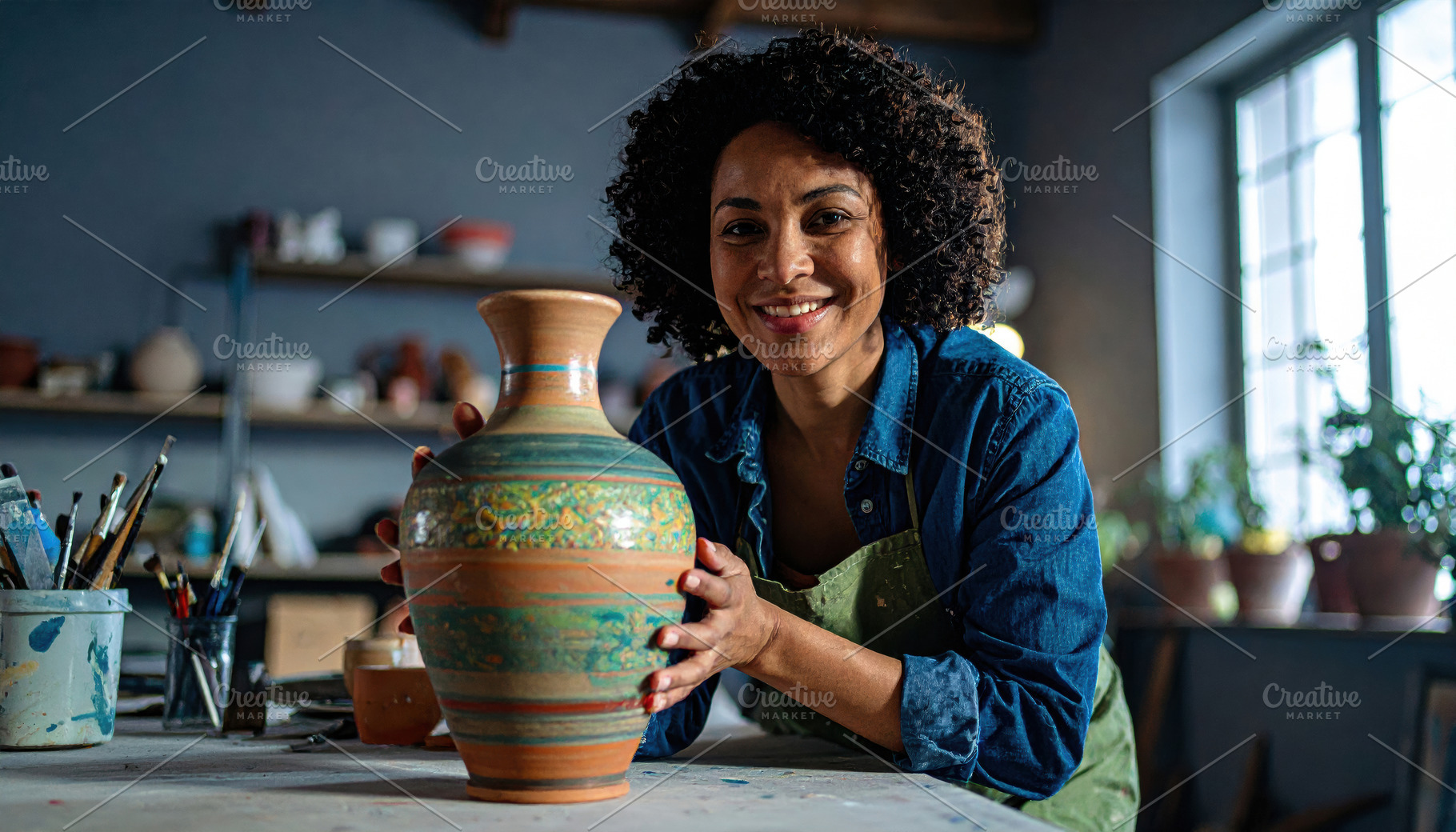 Smiling Female Potter Holding Handcrafted Vase, an Arts & Entertainment Photo by Davizro's Market