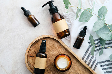 Set of natural organic SPA beauty products on wooden board with eucalyptus bran, a Health & Medical Photo by photoguns