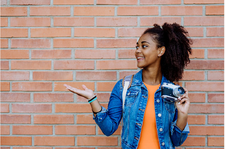 Multiracial girl standing in front, a Person Photo by HalfPoint
