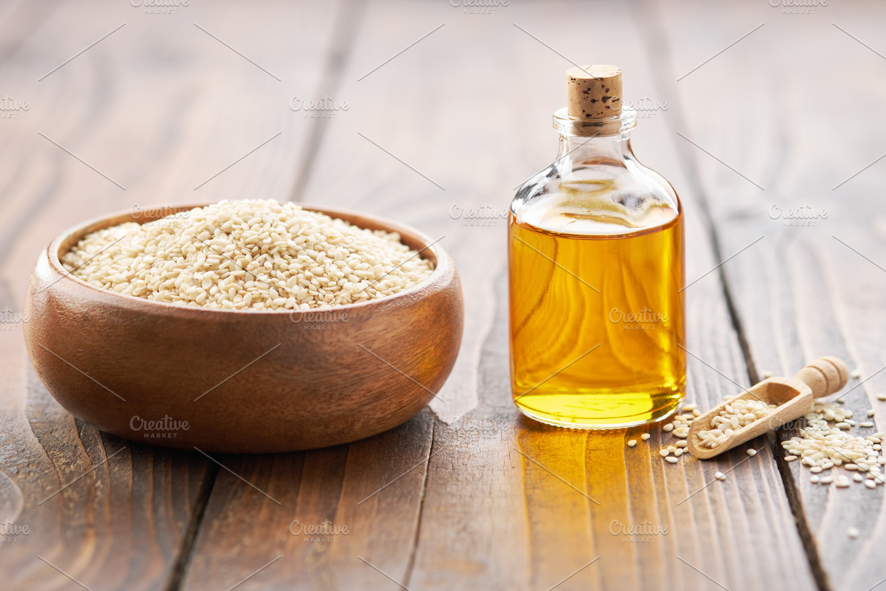 Bowl of sesame seeds and oil bottle., a Food & Drink Photo by chamillewhite