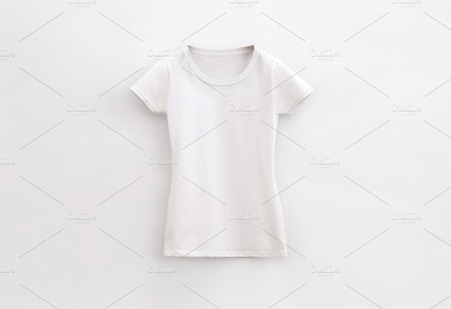 round neck lady fit white t-shirt, a Photo by UN-BRANDED