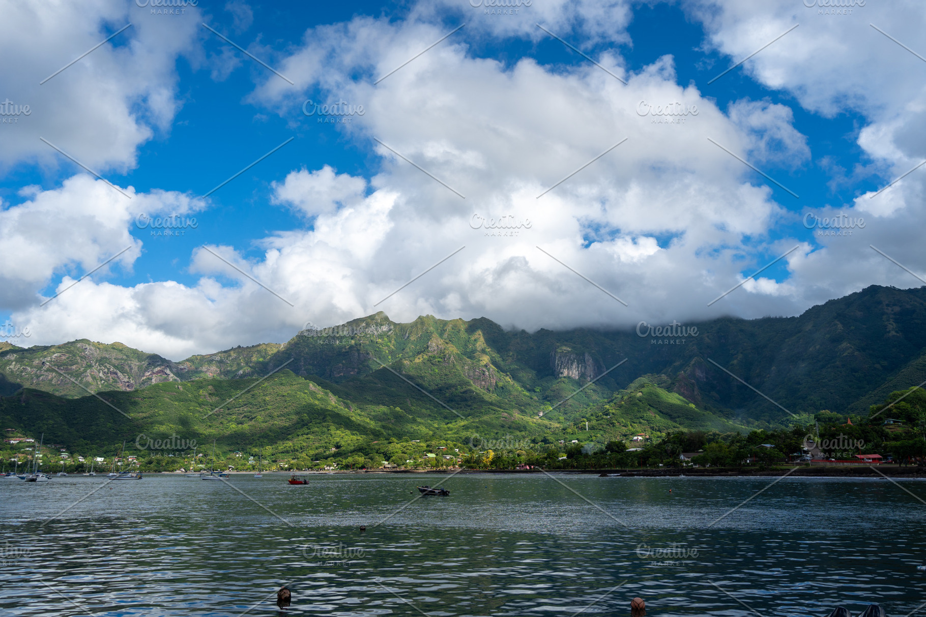 Taiohae Bay and town with anchored sailboats in Nuku Hiva, Marqu, a Nature Photo by GoodGoods