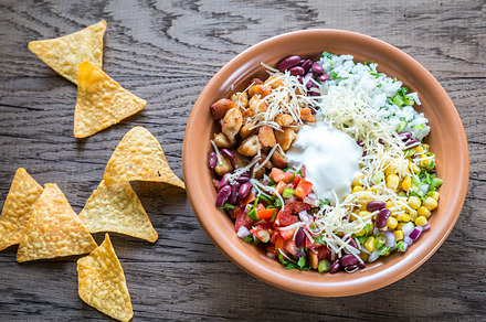 Chicken burrito bowl, a Background Photo by Alexander Prokopenko