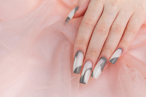 Hand with long marble nail art design, a Beauty & Fashion Photo by Olena Rudo