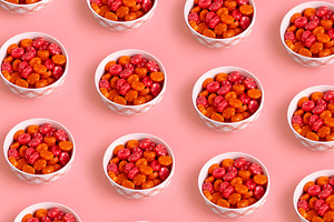 Seamless repeating pattern of white bowls filled with red and or, a Food & Drink Photo by Ales Munt