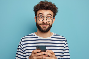 Cheerful young man with glasses and, a Person Photo by MistyDay