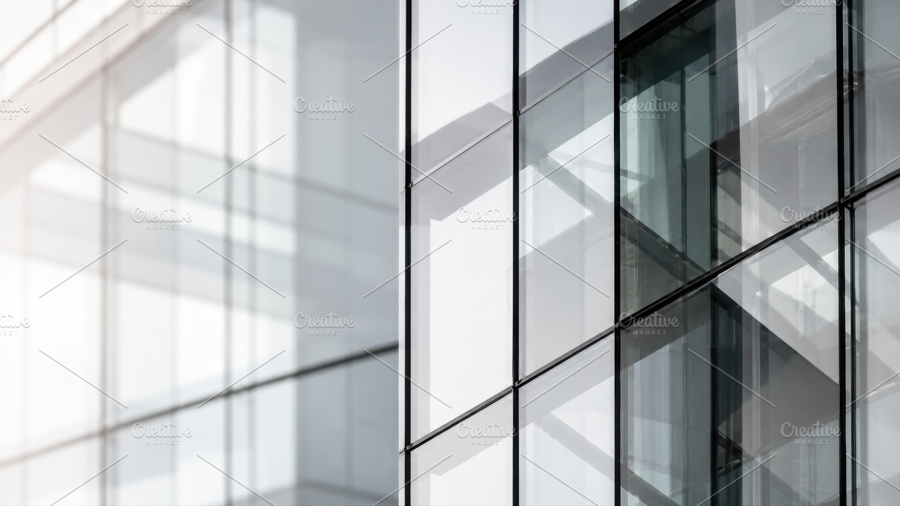 Sunlight reflects on glass facade, a Photo by Beautiful things