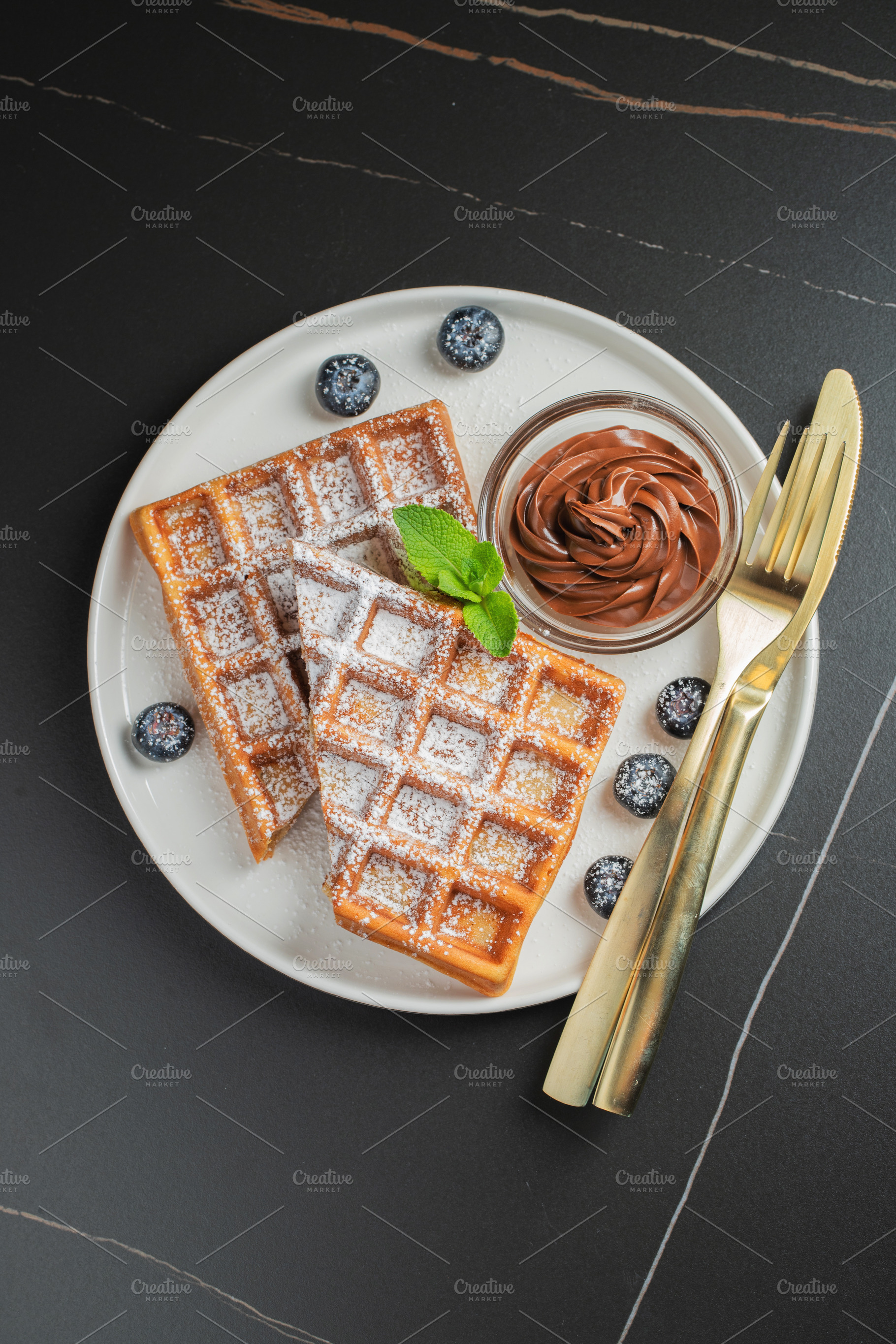 Belgium waffles Homemade waffles with strawberries, a Food & Drink Photo by Budarinphoto