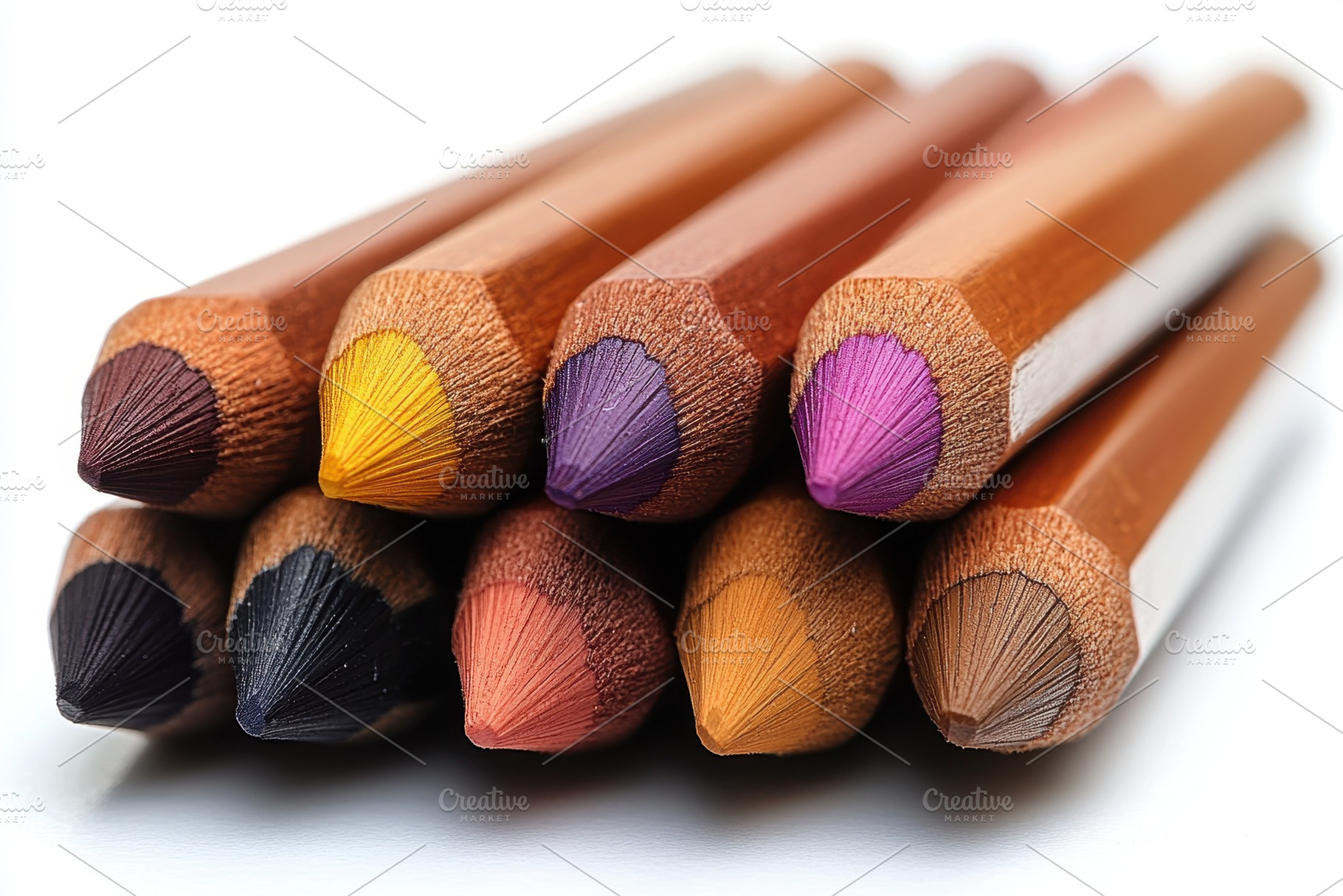 Colored pencils arranged in a vibran, a Photo by Tanuart