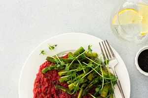 Beetroot risotto with rice, a Food & Drink Photo by Pundateam