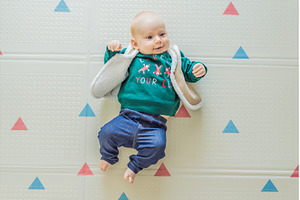 Adorable baby dressed in a Christmas, a Holiday Photo by Elizaveta Galitskaya