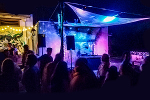 Outdoor night concert with crowd and colorful lights, an Arts & Entertainment Photo by DanFLCreativo