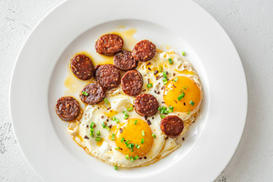 Hearty fried chorizo eggs, a Food & Drink Photo by Alexander Prokopenko