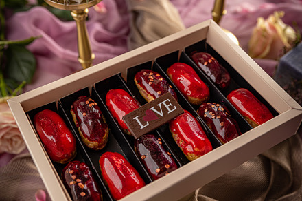 Box of eclairs, a Background Photo by Grafvision photography