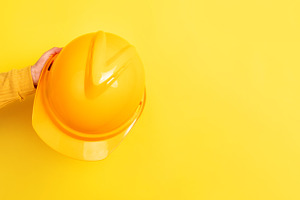 Yellow Safety Helmet on Yellow Background, an Industrial Photo by Ales Munt