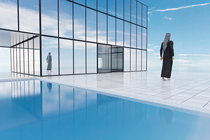 Arab man walking near modern glass building and pool, an Architecture Photo by RF Images