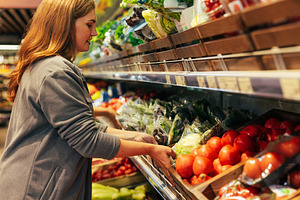 Female grocery store worker, a Food & Drink Photo by Artem Varnitsin