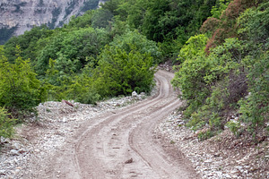 Turn in the road in the mountains., a Photo by Schreibikus