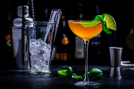 Spring grass alcoholic cocktail drink with scotch whiskey, apple