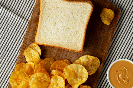 Homemade American Peanut Butter Sandwich on a Wooden Board, top