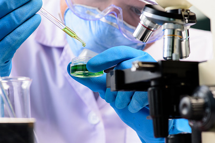 Science background stock photo containing analyzing and beaker