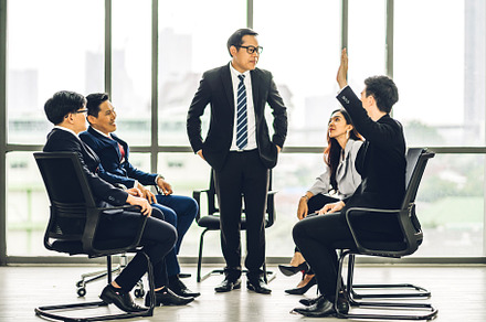 Businessman coach speaker presentation and discussing meeting st, a Person Photo by Art_Photo