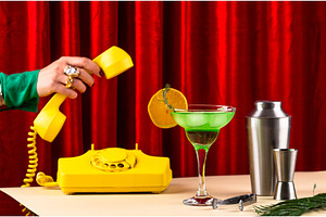 Retro green cocktail against a red, a Food & Drink Photo by Yulia Furman