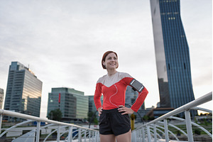 Sporty woman runner preparing for, a Person Photo by HalfPoint