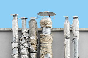 Old air duct ventilation chimneys, an Industrial Photo by BOOCYS