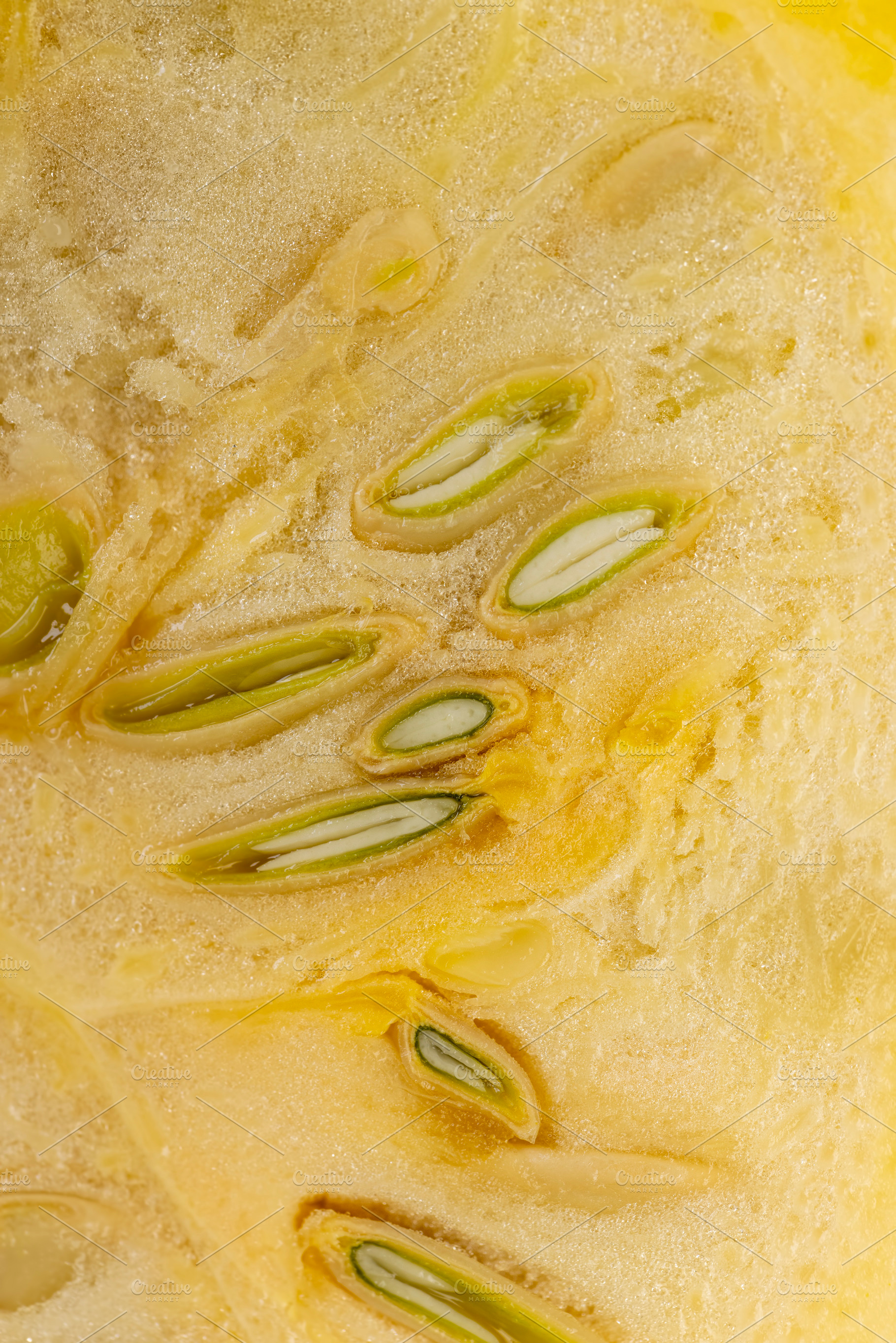 Slice natural yellow-orange ripe pumpkin or zucchini, slicing ripe zucchini on, a Photo by rsoollAI