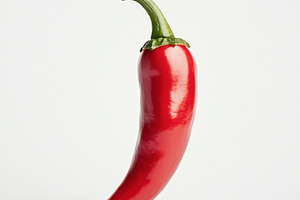 Fresh Red Chili pepper, isolated on, a Food & Drink Photo by Pixeness Studio