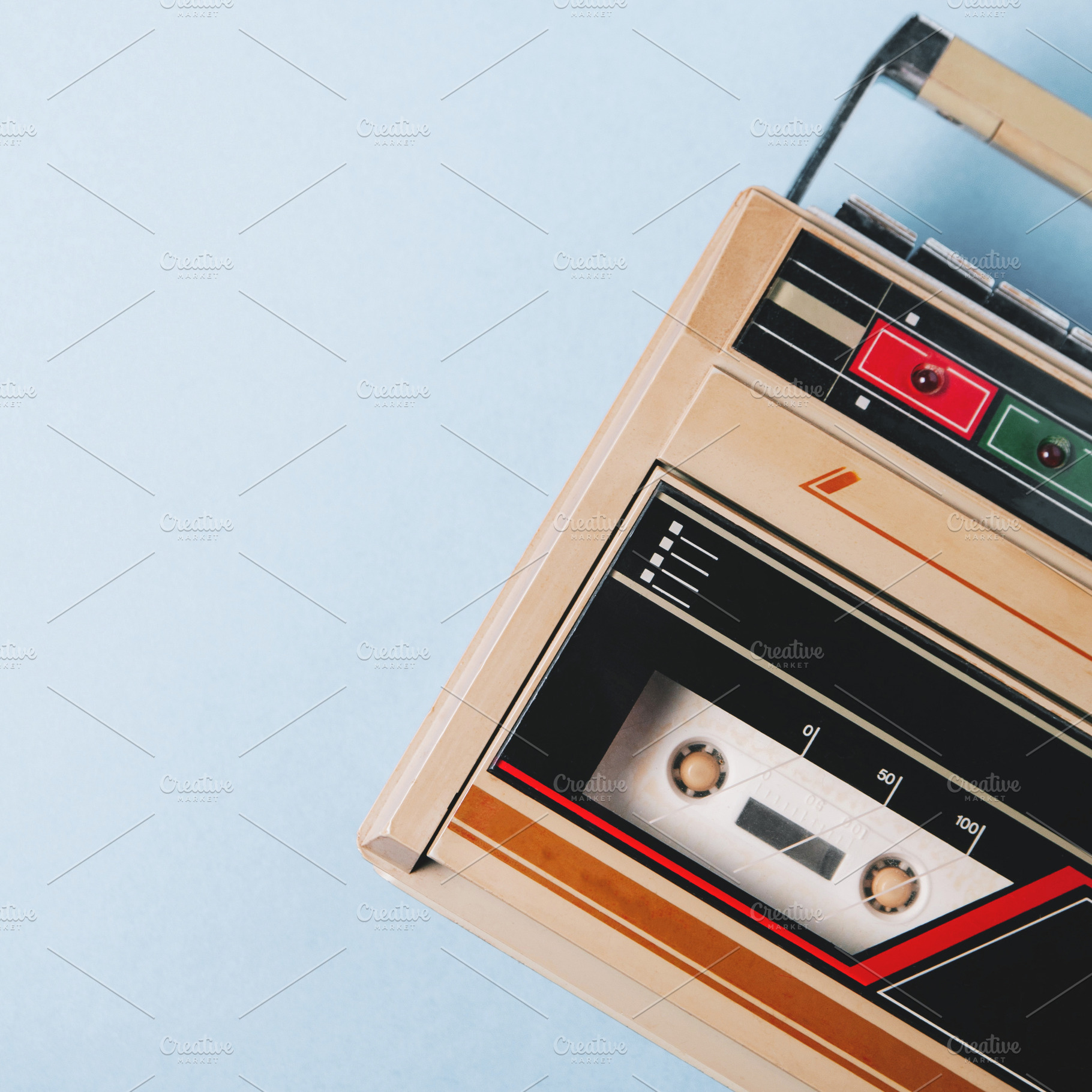 Old cassette tape recorder on a blue, an Arts & Entertainment Photo by Alekseyliss