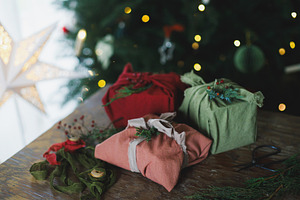 Merry Christmas! Stylish christmas presents wrapped in fabric wi, a Holiday Photo by Sonjachni