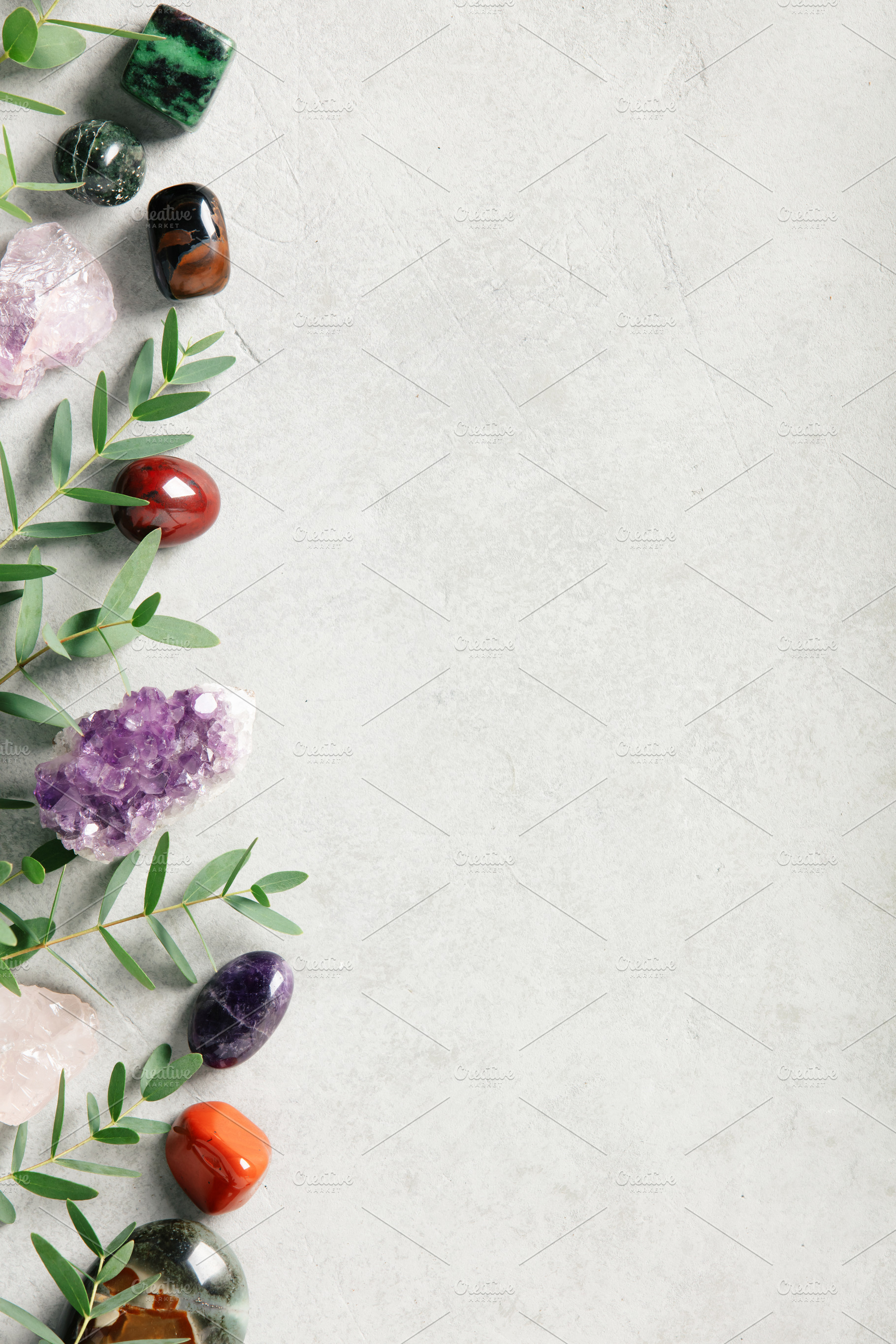 Healing Crystals and Green Leaves on Textured Concrete Backgroun, an Arts & Entertainment Photo by Natalia Klenova's Shop