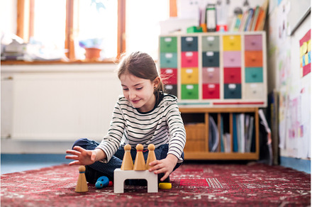 Portrait of schoolgirl using, a School & Education Photo by HalfPoint