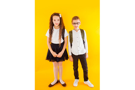 The little couple of schoolkids are, a Person Photo by oksix