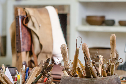 Workshop of a craftsman pottery containing art, artisan, and bowl
