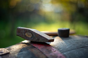 Winemaking hammer on the barrel in the vineyard, an Industrial Photo by Mark Borbely