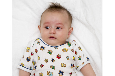 Cute baby lies on a white background, a Person Photo by shahin.mammadov