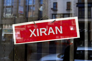 closed sign in Somali, a Photo by WorldOfPhotos