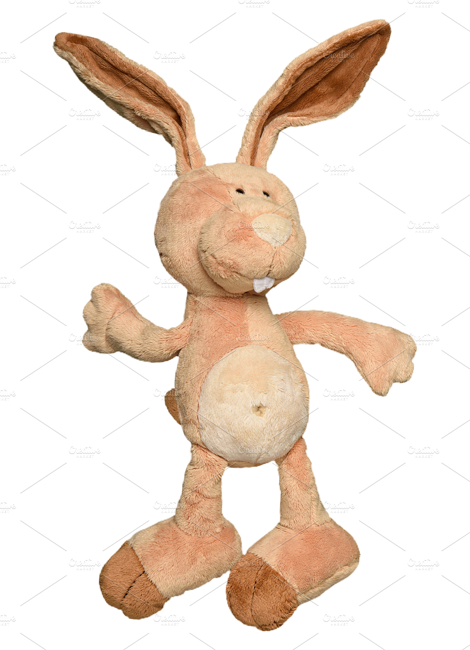 Soft plush toy in the form of a beige hare with long ears and bi, an Animal Photo by ndanko