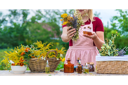 Woman with medicinal herbs and, a Nature Photo by yanadjana