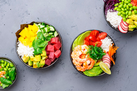 Poke bowl set with  tuna, salmon, shrimp with avocado, mango, ra, a Food & Drink Photo by 5PH