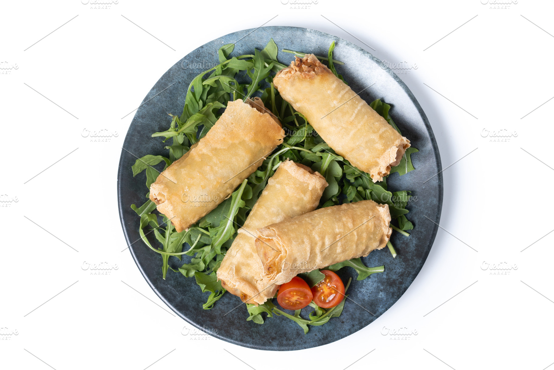 Crispy vegetables spring Rolls isolated on white background, a Food & Drink Photo by etorres69