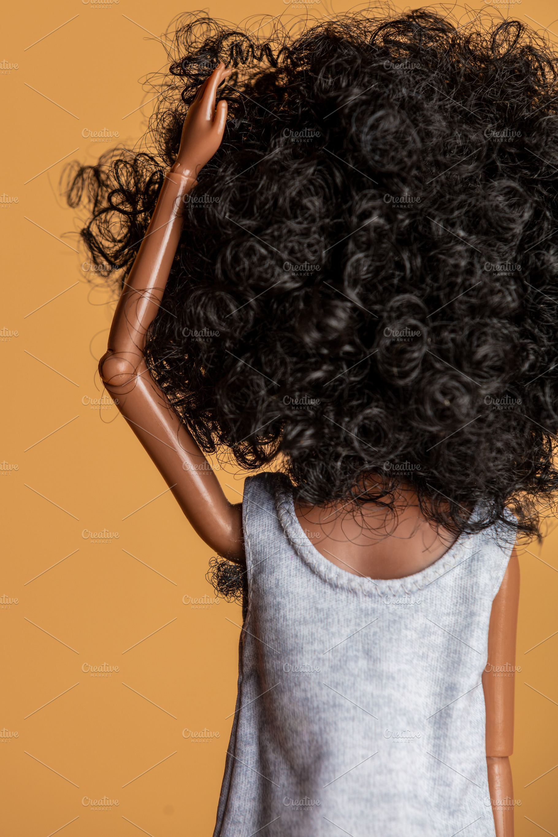 african-american female doll showing underarm hair, a Person Photo by Masson Simon